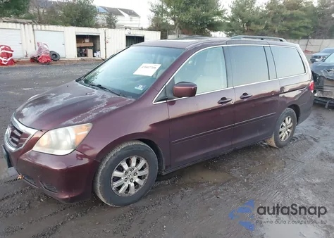 2010 Honda Odyssey Ex-L z USA, uszkodzony, nr VIN 5FNRL3H68AB091787